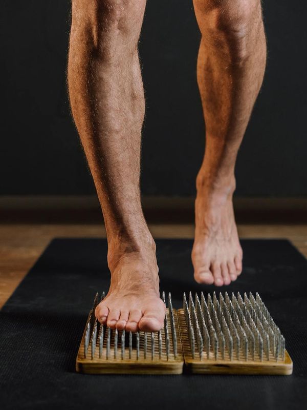 Silhouette of a man standing tall, conveying a sense of stability and inner strength.